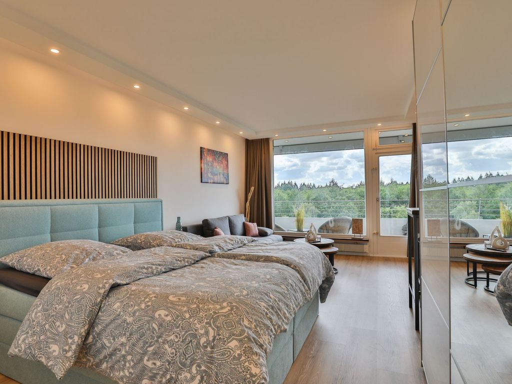 Strandkoje 6: Modernes Apartment mit Boxspringbett, Spiegelschrank und Weitblick – Erholung in Timmendorfer Strand.