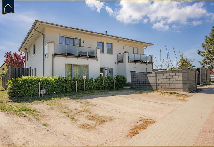 Ferienwohnung mit Gartenblick, Kamin und Balkon am Wolgastsee