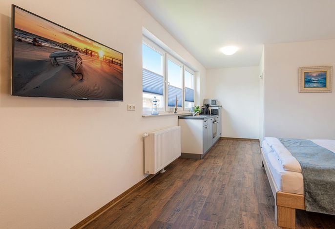 Moderne Ferienwohnung mit Garten – strandnah und ideal für zwei Personen