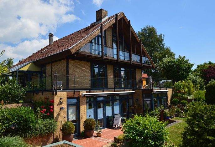 Familienfreundliches Ferienhaus in Pelzerhaken mit Garten, großzügigem Wohnbereich, separatem Kaminzimmer und Sauna