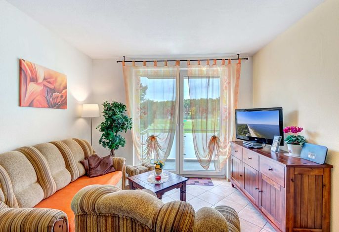 Gemütliche Ferienwohnung mit Balkon – strandnah & familienfreundlich