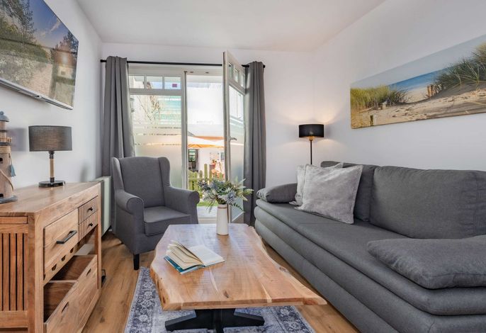 Gemütliche Ferienwohnung mit Terrasse und Meerblick – nur 150 m zum Strand
