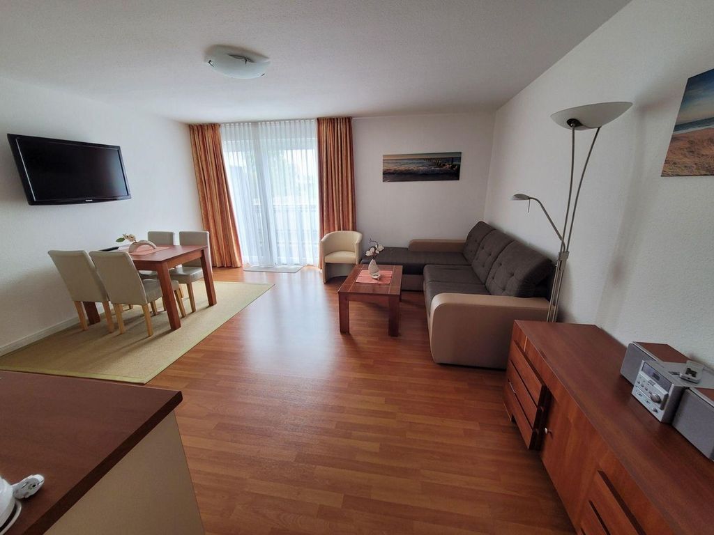 Wohnzimmer mit Schlafsofa