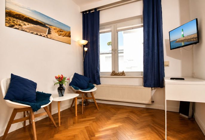 Ihr Ferienzimmer beim Leuchtturm Warnemünde für zwei Gäste.