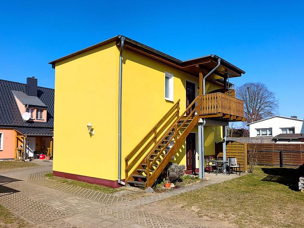 Außenansicht des Hauses mit eigenem Aufgang zur oberen Etage