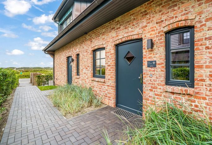 Strandnahes Wohnen für 4 Personen im Neubau mit Terrasse und eigener Sauna