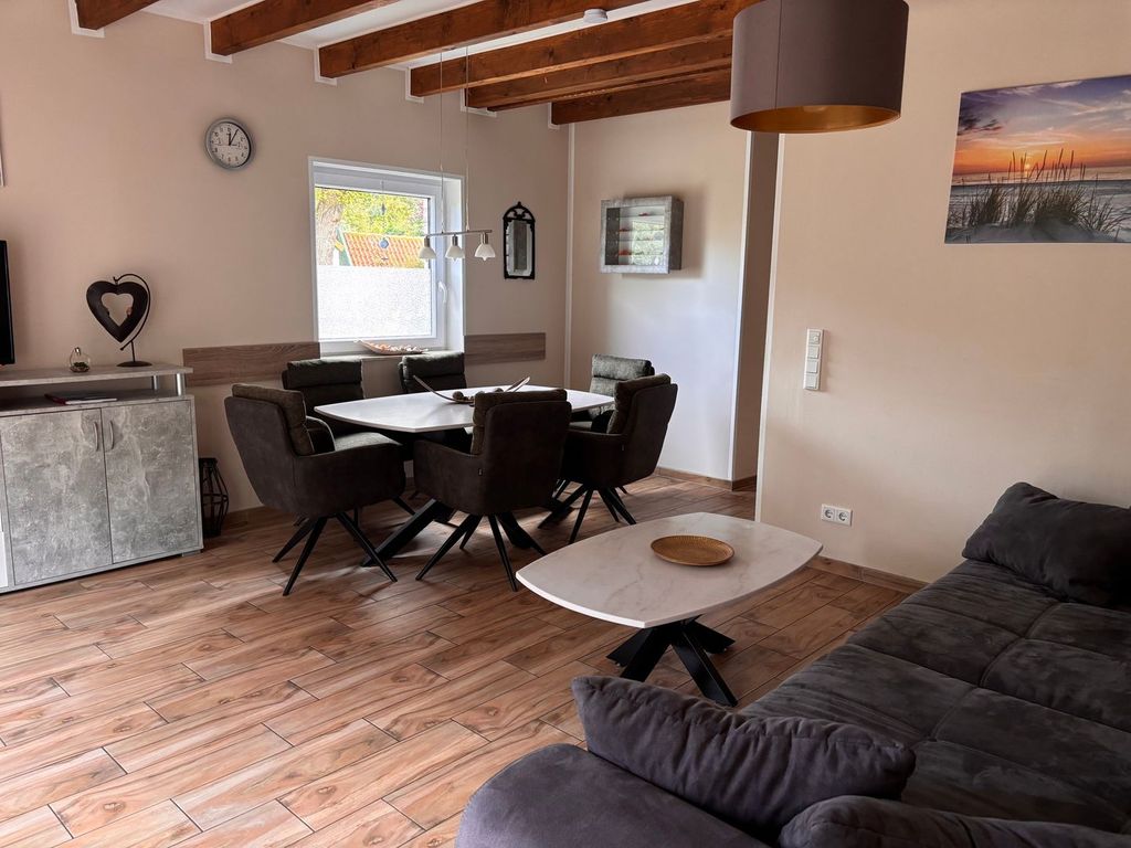 Wohn-Essbereich mit Esstisch im wrho12, Haus Lea in Wremen