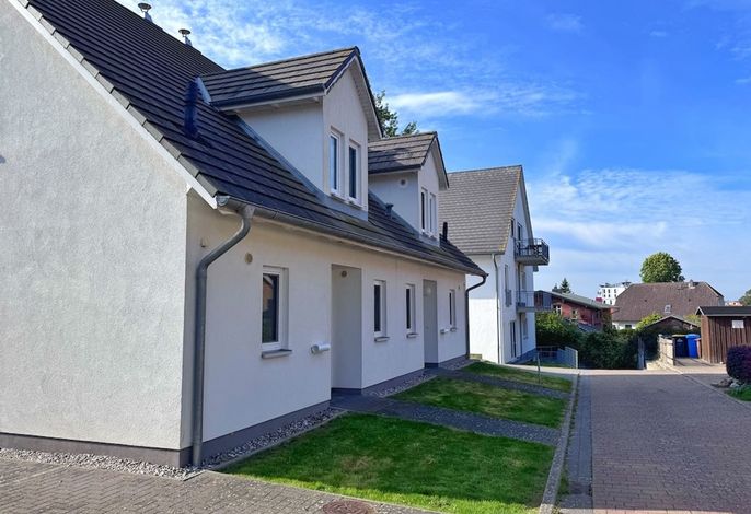 Photo Moderne Haushälfte mit drei Schlafzimmern und Kamin 4