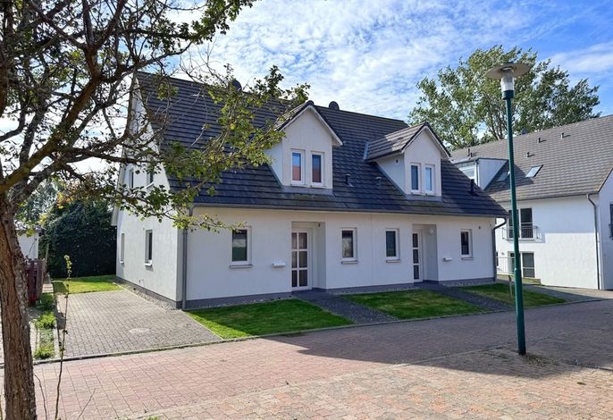 Photo Moderne Haushälfte mit drei Schlafzimmern und Kamin 7