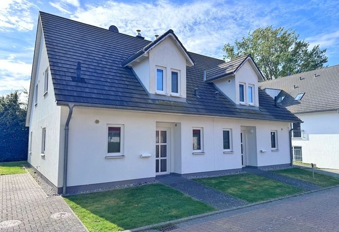 Photo Moderne Haushälfte mit drei Schlafzimmern und Kamin 6