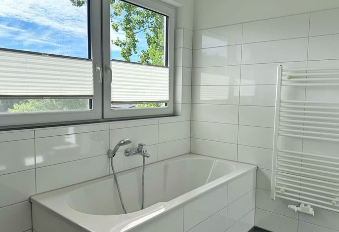 Photo Moderne Erdgeschosswohnung mit 3 Schlafzimmern und Kamin 3