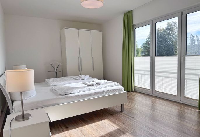 Photo Moderne Erdgeschosswohnung mit 3 Schlafzimmern und Kamin 1