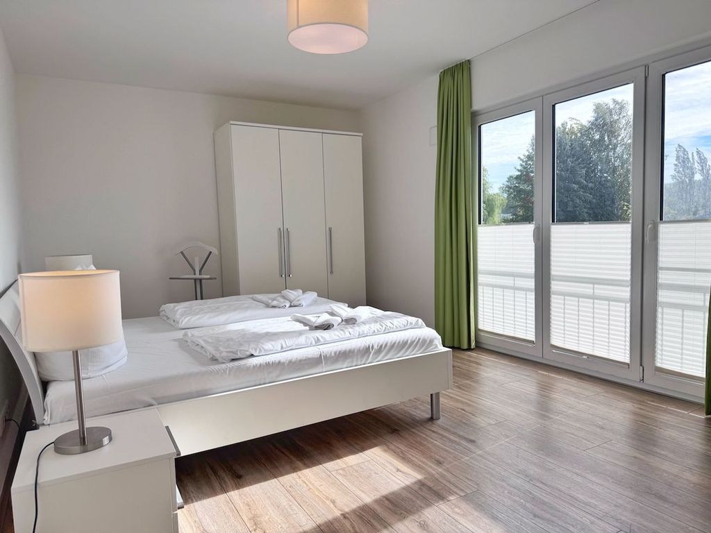 Moderne Erdgeschosswohnung mit 3 Schlafzimmern und Kamin