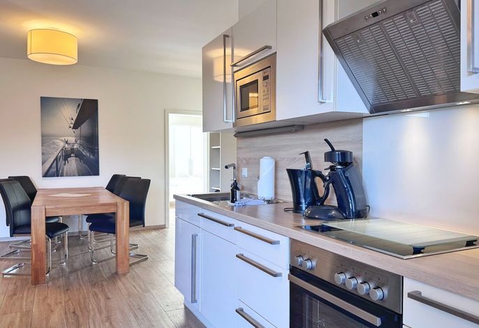 Photo Moderne Erdgeschosswohnung mit 3 Schlafzimmern und Kamin 2