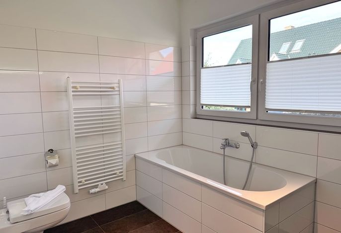 Photo Moderne Erdgeschosswohnung mit 3 Schlafzimmern und Kamin 4