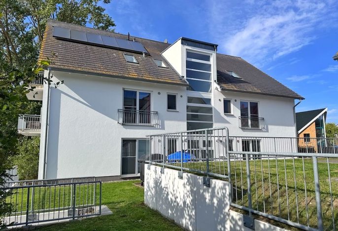 Photo Moderne Erdgeschosswohnung mit 3 Schlafzimmern und Kamin 9