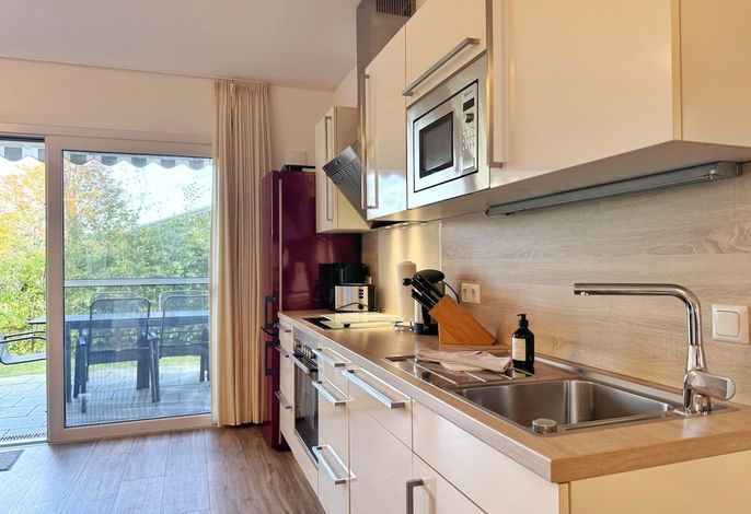Photo Moderne Erdgeschosswohnung mit 3 Schlafzimmern und Kamin 3