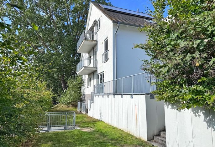 Photo Moderne Erdgeschosswohnung mit 3 Schlafzimmern und Kamin 10