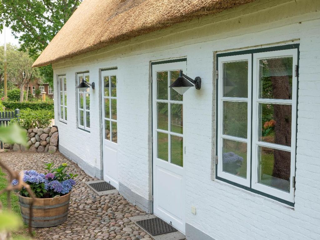 Beide Wohnungen haben ihren eigenen Zugang zum Garten.