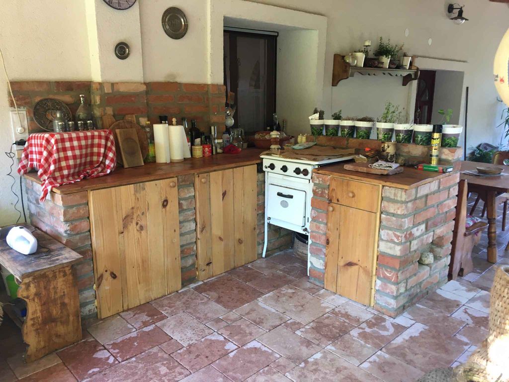 Ferienhaus mit Terrasse und Klimaanlage im Bauernstil