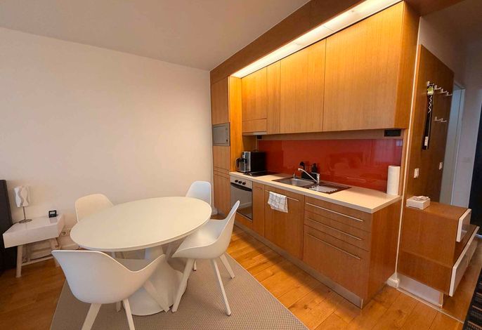 Ferienwohnung mit Balkon und Blick aufs Wasser