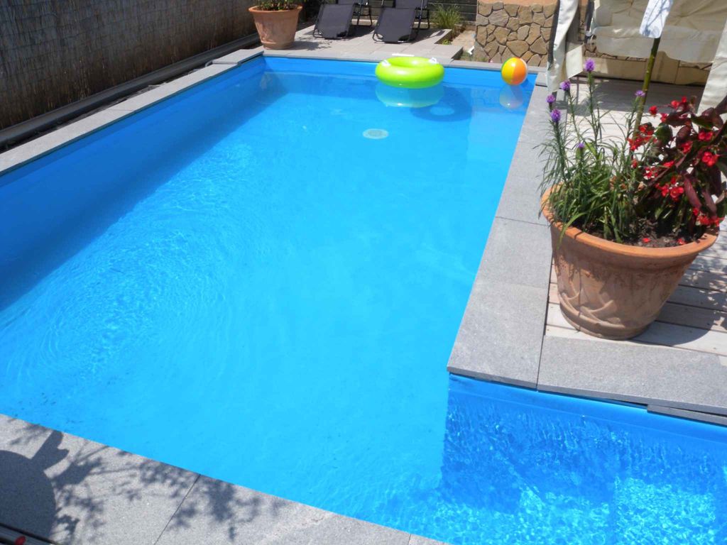 Ferienwohnung mit Pool, Klimaanlage und Waschmaschine