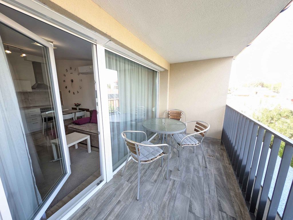Ferienwohnung mit moderner Ausstattung und Klimaanlage, in der Nähe des Zentrums und des Strandes