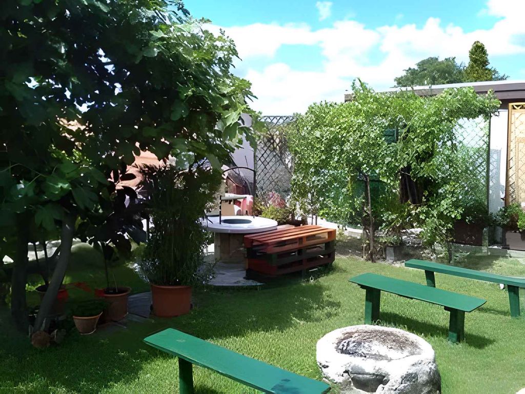 Ferienhaus mit Garten nur 50 m vom Zentrum