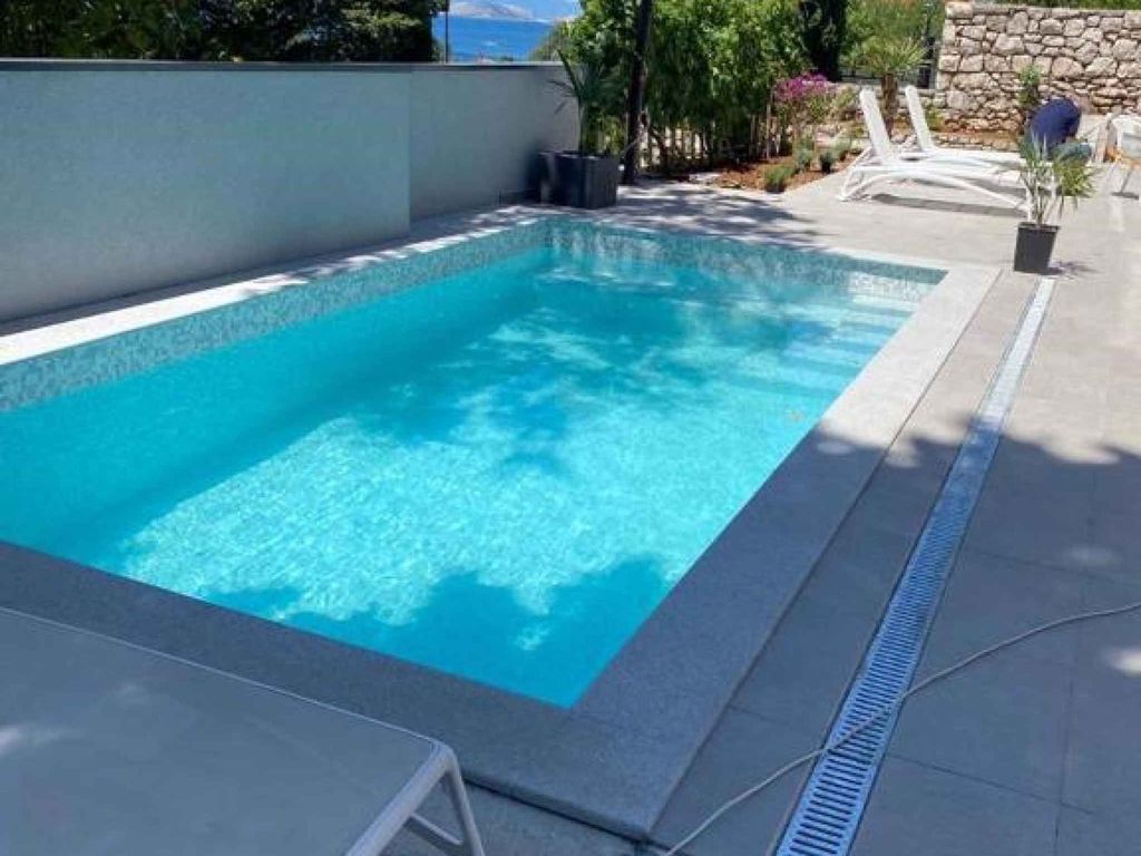 Ferienwohnung mit Meerblick und Pool