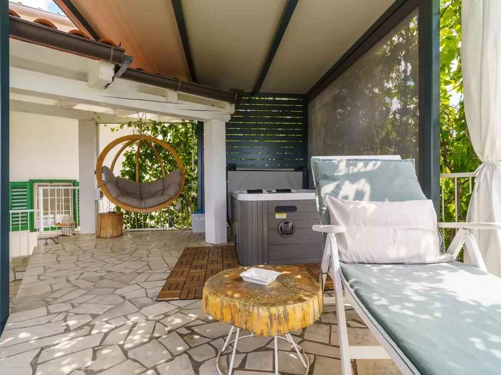 Ferienhaus mit Whirlpool und Klimaanlage