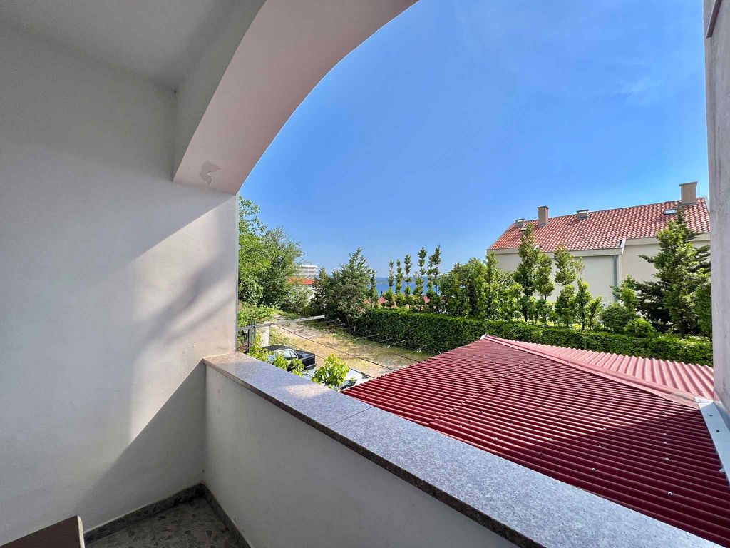 Ferienwohnung mit Terrasse, Klimaanlage und Garten