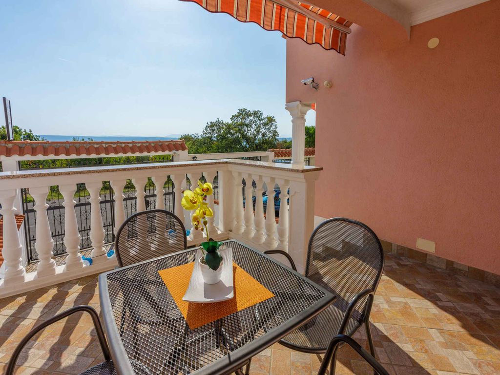 Ferienhaus mit Balkon und Meerblick