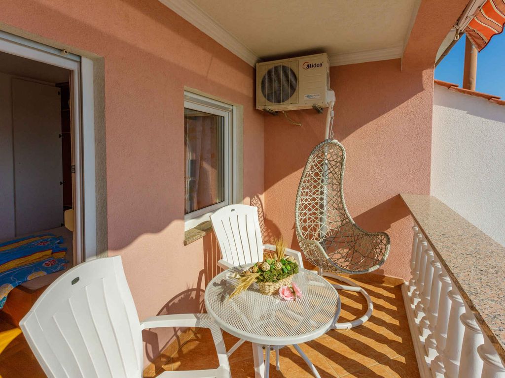Ferienhaus mit Balkon und Meerblick