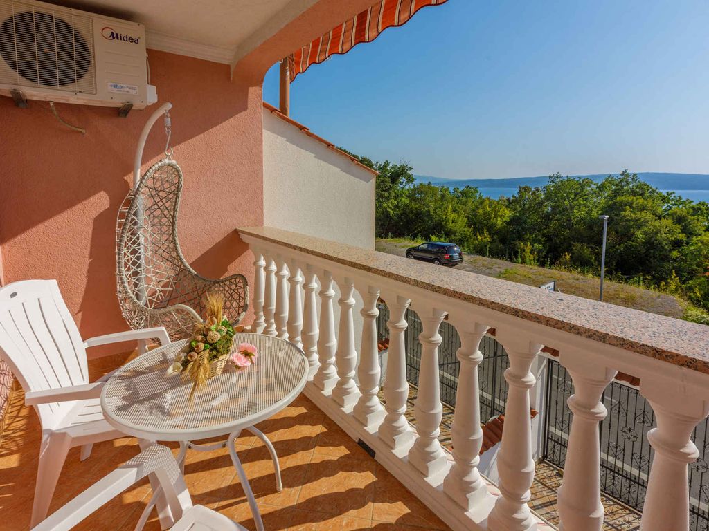 Ferienhaus mit Balkon und Meerblick