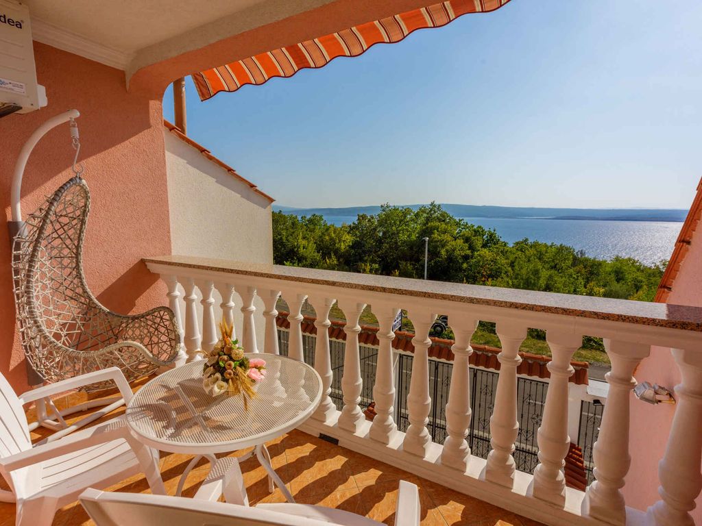 Ferienhaus mit Balkon und Meerblick