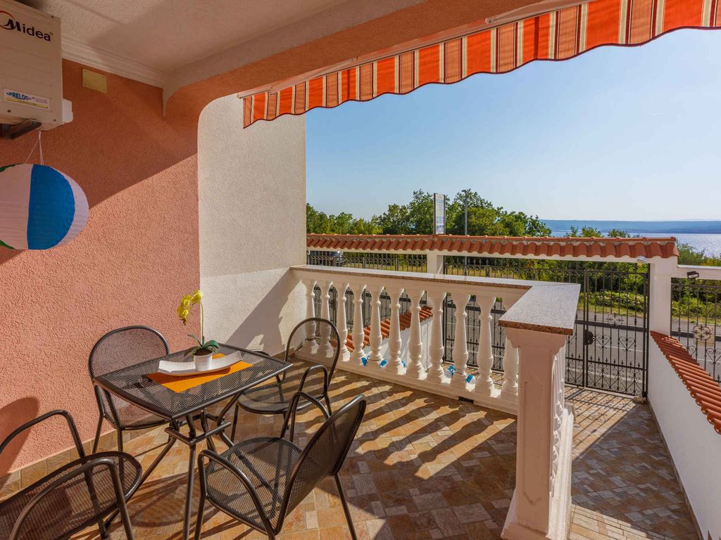 Ferienhaus mit Balkon und Meerblick