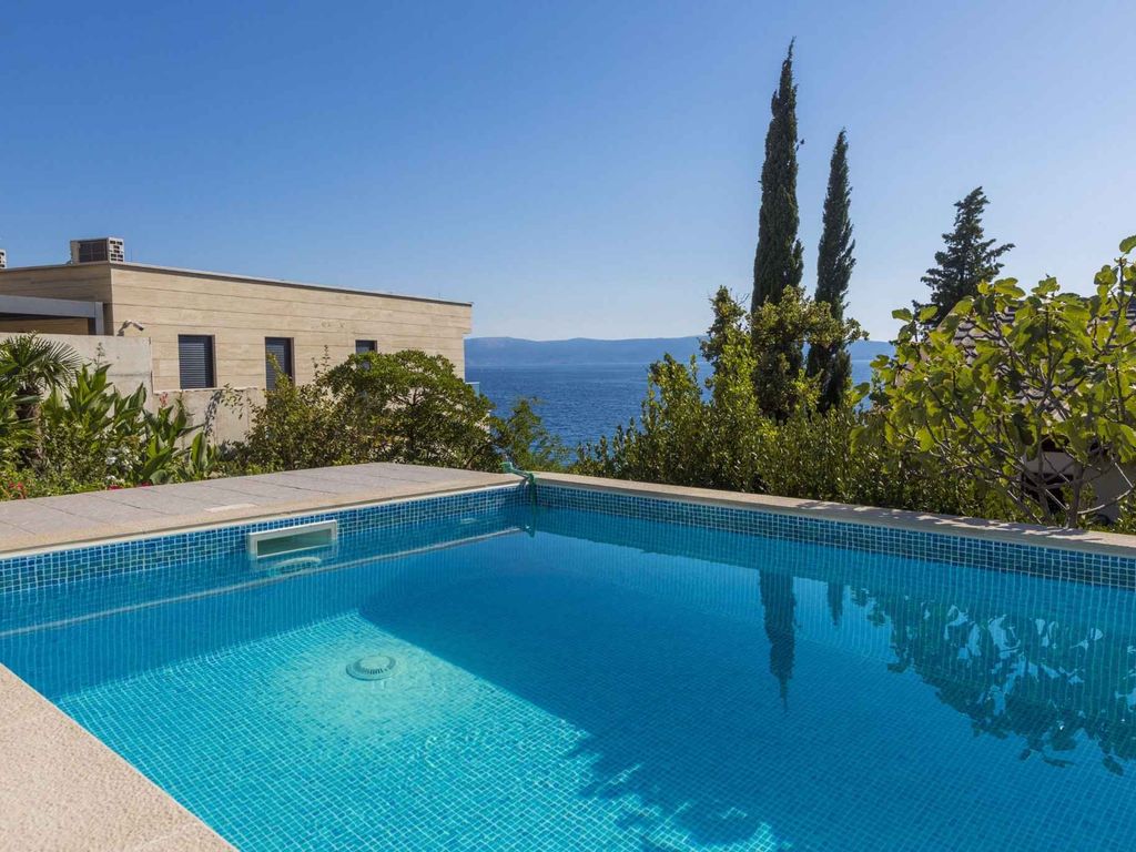 Ferienwohnung mit Meerblick und Pool