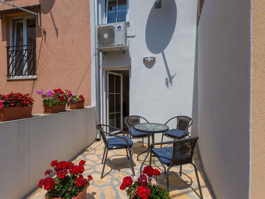 Ferienhaus mit Terrasse und Klimaanlage