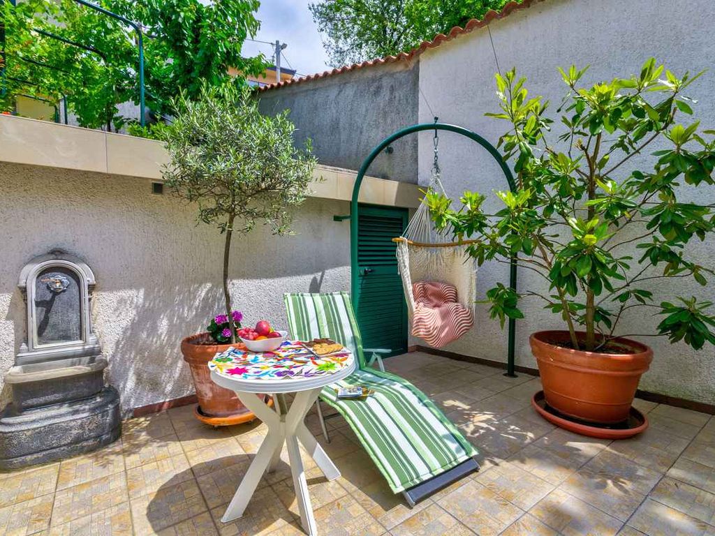 Ferienhaus mit Meerblick und Terrasse in Strandnähe