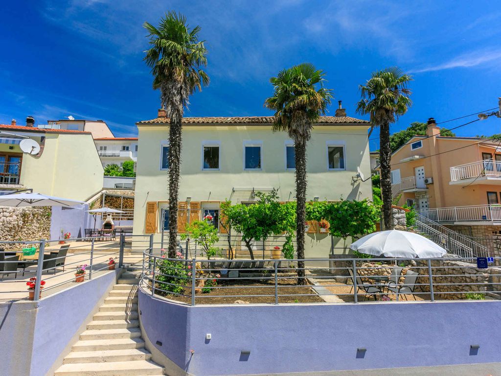 Ferienhaus mit gemütlicher Terrasse, Grill und Meerblick