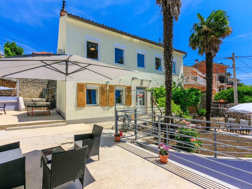 Ferienhaus mit gemütlicher Terrasse, Grill und Meerblick