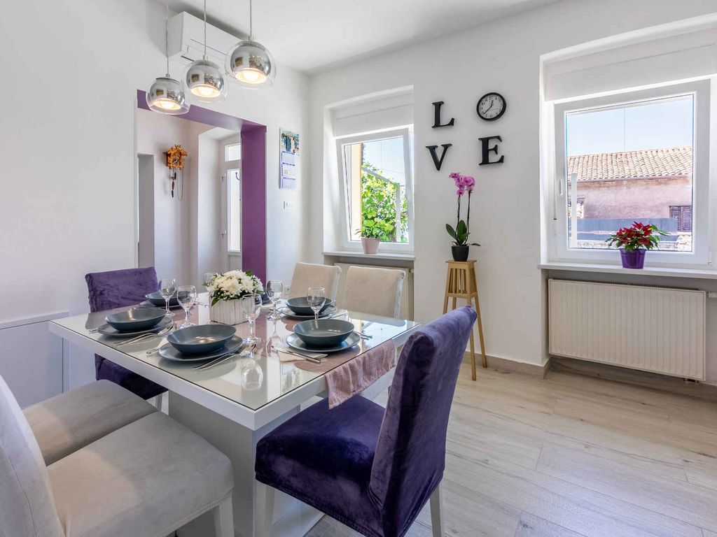 Ferienhaus mit gemütlicher Terrasse, Grill und Meerblick