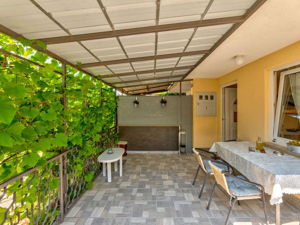 Ferienwohnung mit Meerblick und privater Terrasse