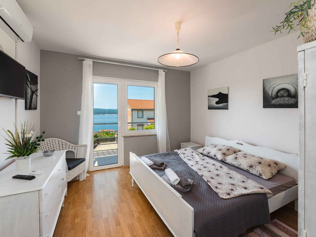 Ferienwohnung mit Meerblick und privater Terrasse