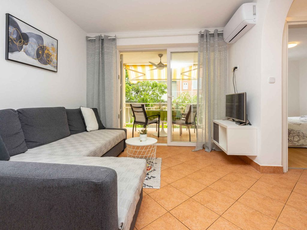 Ferienwohnung mit Klima und privatem Parkplatz