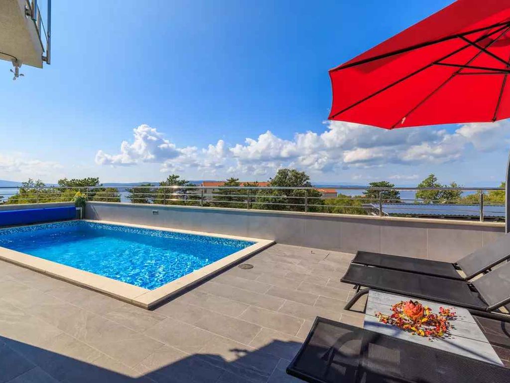 Ferienhaus mit Swimmingpool und Meerblick