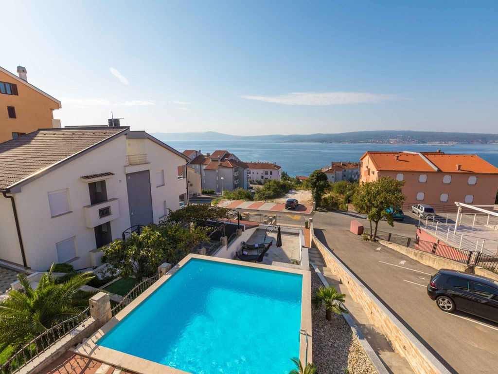 Ferienwohnung mit Pool und Meerblick