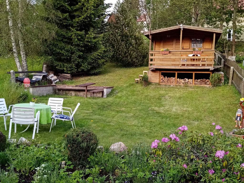 Ferienhaus mit Kamin im Skiort