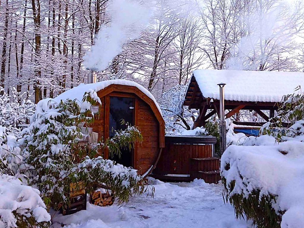 Ferienhaus mit Garten-Wellness