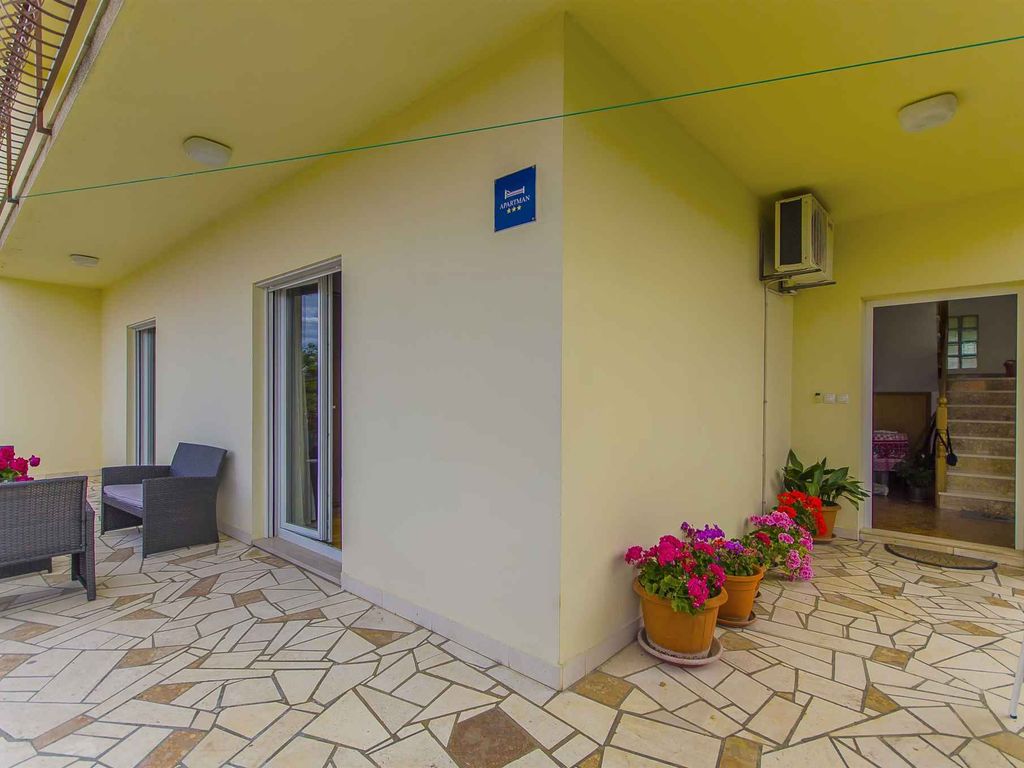 Ferienhaus mit Klimaanlage und Grill